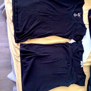 Two tight black shirts